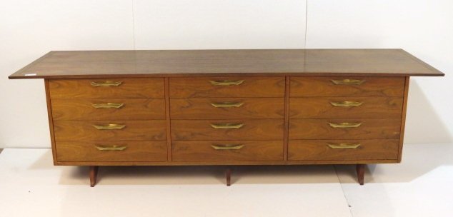 GEORGE NAKASHIMA WIDDICOMB WALNUT TRIPLE DRESSER: Walnut. Very good condition. 32 1/4"h. x 105"w. x 23"d.