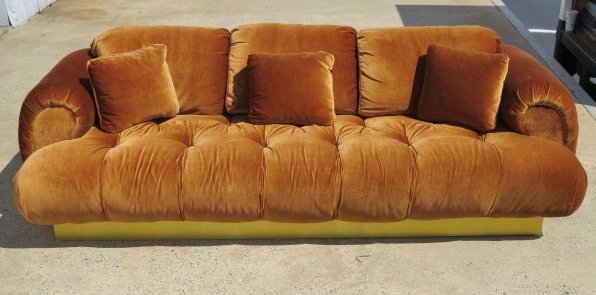1970'S DIRECTIONAL UPHOLSTERED SOFA: Brass wrapped base. Very good condition. 30"h. x 97"w. x 40"d.