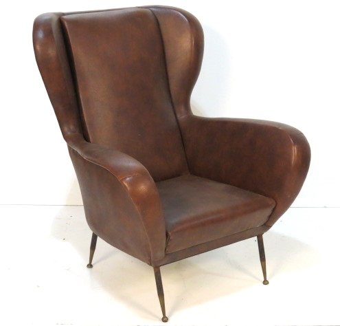 ITALIAN MODERN BROWN VINYL LOUNGE CHAIR: Iron and brass legs. Good condition. 40"h. x 33"w. x 35"d.