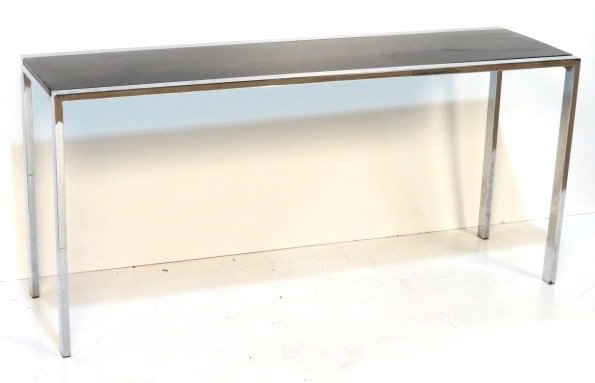 MILO BAUGHMAN STYLE CHROME SOFA TABLE: Faux black marble top with chips and scratches. 25 1/4"h. x 53 3/4"w. x 16"d.