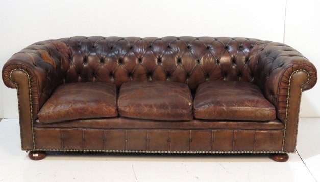 TUFTED LEATHER CHESTERFIELD SOFA: Distressed leather with lots of wear. Damage to leather. Poor condition. 31"h. x 86"w. x 31"d.