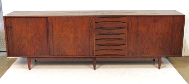 ARNE VODDER for SIBAST ROSEWOOD SIDEBOARD: Rosewood. Sliding doors. Good condition with some wear to finish on top. 32"h. x 98 1/4"w. x 18 1/2"d.