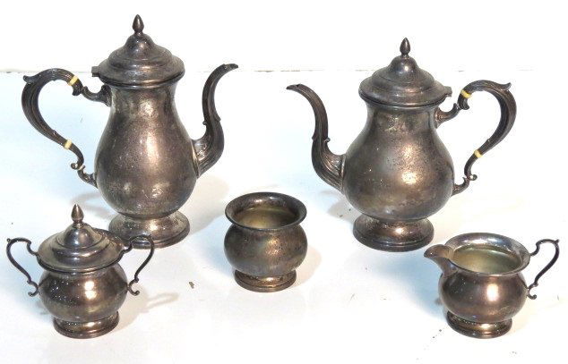 5 pc. STERLING SILVER TEA SET: Includes coffee pot, tea pot, creamer, sugar bowl and waste bowl. Coffee pot 10" high. 54.4 troy oz. total weight.