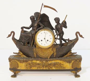 FRENCH CHRONOS & AMOUR FIGURAL BRONZE CLOCK: Gilt and patinated bronze. Bronze mounted marble base. 20 1/2"h. x 21 1/2"w. x 7"d.