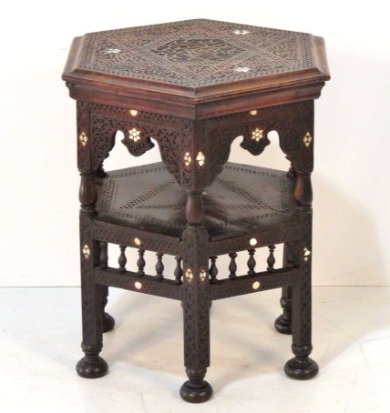 ANTIQUE CARVED MOORISH HEXAGONAL STAND: Mother of pearl inlay. 23"h. x 20 1/2"diam.