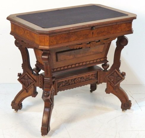 VICTORIAN EASTLAKE LIFT TOP SEWING TABLE: Carved walnut with burl walnut panels. 31"h. x 33"w. x 22"d.