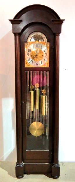 ANTIQUE HERSCHEDE MAHOGANY GRANDFATHER'S CLOCK: Retailed by B.J. Cooke & Sons of Philadelphia. Mahogany case. Moon dial. 9 tubes and 3 weights. 81"h. x 21"w. x 15"d.