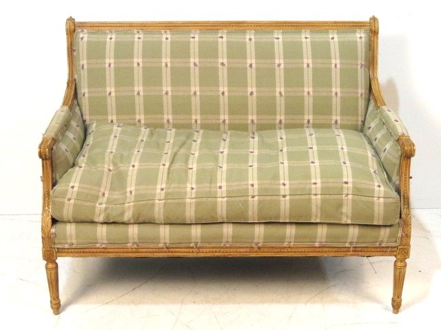 LOUIS XVI STYLE CARVED SETTEE: Distressed painted finish. 34"h. x 48"w. x 26"d.