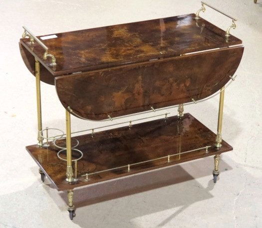 ALDO TURA DROPLEAF BAR CART: Lacquered goat skin with brass mounts. 29 3/4"h. x 33"w. x 18"d.