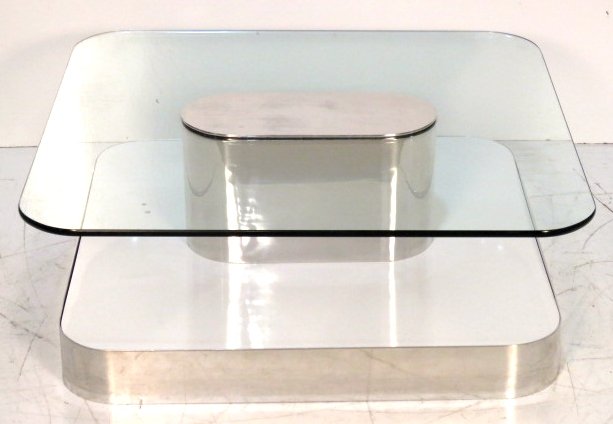 PIERRE CARDIN STYLE GLASSTOP CHROME COCKTAIL TABLE: Chrome and white laminate base. Glass top. 13"h. x 36"sq.