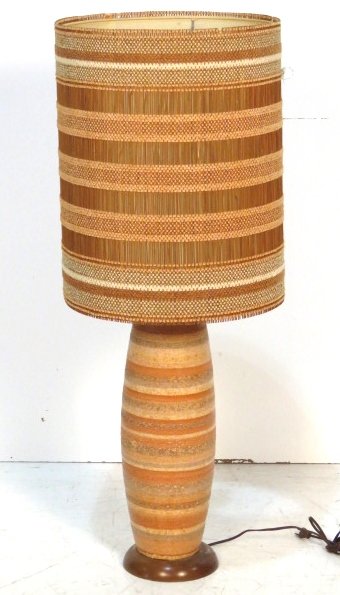 MID CENTURY MODERN VOLCANIC GLAZE CERAMIC LAMP: Ceramic lamp with custom woven lamp shade. 40"h. to top of shade. 22"h. to top of vase.