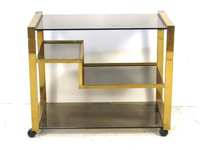 1970'S ITALIAN MODERN BRASS & GLASS BAR CART: Brass with smoke glass shelves. 26"h. x 31"w. x 17"d.