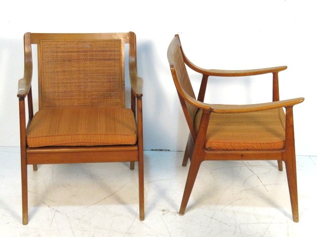 Pair MID CENTURY MODERN CANE BACK LOUNGE CHAIRS: Walnut with caned backs. 31 1/4"h. x 25 3/4"w. x 25"d.
