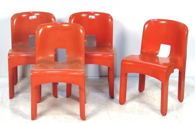 4 JOE COLUMBO KARTELL RED PLASTIC CHAIRS: Set of 4 Kartell stacking chairs. 28 1/4"h. x 16 3/4"w. x 19"d.