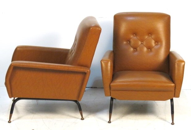 Pair ITALIAN MODERN METAL LEG LOUNGE CHAIRS: Brown naugahyde with iron metal legs. 33 1/2"h. x 28"w. x 32 1/2"d.