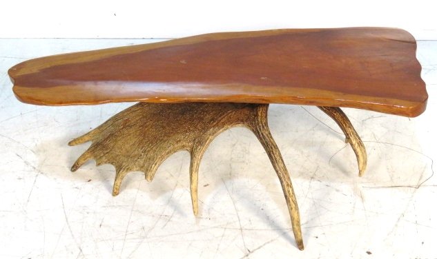 E. WARHOL MOOSE ANTLER BASE COFFEE TABLE: Signed E. Warhol 2-81. Solid cherry slab top on moose antler base. 14 1/2"h. x 42 3/4"w. x 21"d.