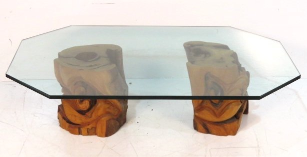 JEFFREY GREENE FREE FORM TREE TRUNK COFFEE TABLE: Tree trunk pedestals. Glass top. Signed Jeffrey Greene. 15 1/4"h. x 55"w. x 35"d.