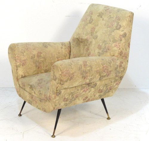GIO PONTI STYLE ITALIAN MODERN LOUNGE CHAIR: Floral upholstery with black metal legs. 36 1/4"h. x 34"w. x 23 1/2"d.