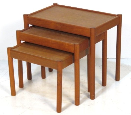 DANISH MODERN TEAK NESTING TABLES: Danish modern teak nesting tables. 21"h. x 24 1/2"w. x 15 1/2"d.
