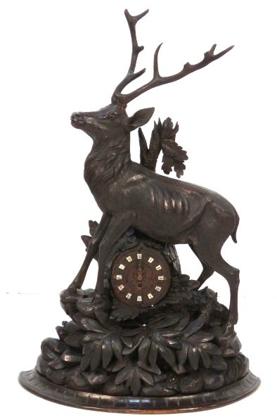 ANTIQUE 32" BLACK FOREST CARVED CLOCK w/ STAG: Black Forest clock with stag. 32 1/4"h. x 29"w. x 9 1/2"d.