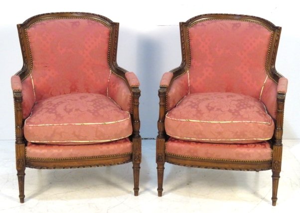 Pair LOUIS XVI STYLE CARVED WALNUT BERGERES: Finely carved frames. 35"h. x 26 1/4"w. x 26 1/2"d.