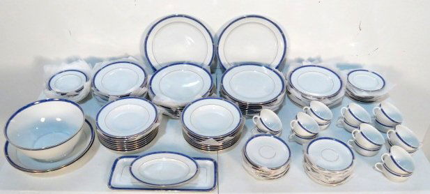 104 pcs. CHRISTOFLE OCEANIC BLEU CHINA DINNERWARE: Service for 16, plus 7 serving pieces.