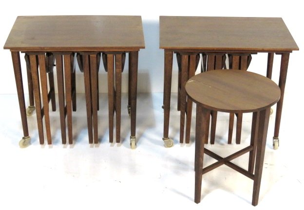 Pair MID CENTURY MODERN NESTING TABLES: Each with 4 folding dropleaf tables. 21 1/2"h. x 24 3/4"w. x 16 3/4"d.
