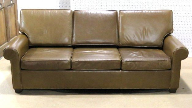 VINTAGE BROWN LEATHER SOFA: Distressed brown leather. 30 1/2"h. x 84"w. x 35"d.