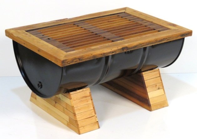 INDUSTRIAL DESIGN TEAK & STEEL DRUM PATIO COFFEE TABLE: Teak and steel drum patio coffee table. 27"h. x 36"w. x 24"d.