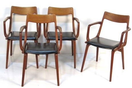 4 ERIK CHRISTENSEN DANISH MODERN TEAK ARMCHAIRS: Solid teak and black naugahyde seats. 31 1/4"h. x 22"w. x 20 3/4"d.