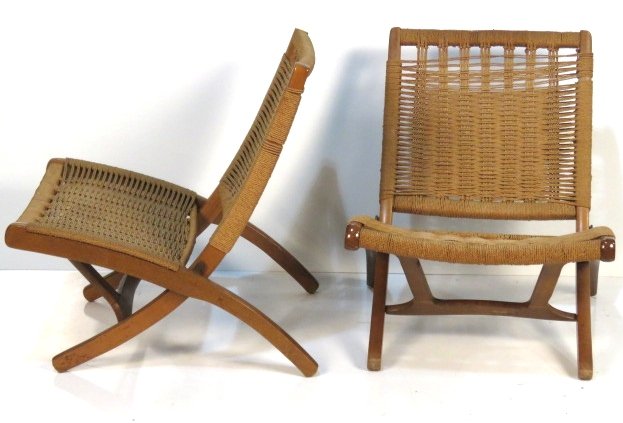 Pair HANS WEGNER STYLE WOVEN GRASS LOUNGE CHAIRS: Wood frames with woven grass. 29 1/2"h. x 24"w. x 30"d.