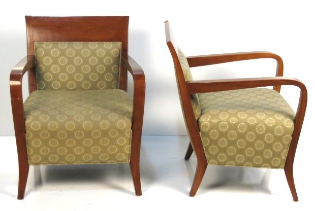 Pair MODERN DESIGN LOUNGE CHAIRS: Walnut finished birch. 34"h. x 27 1/4"w. x 29"d.
