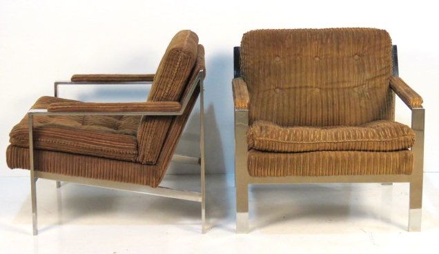 Pair CY MANN MODERN CHROME LOUNGE CHAIRS: Chrome frame with corded brown upholstery. 30"h. x 29 1/2"w. x 31"d.