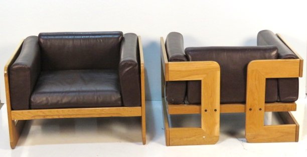 Pair STENDIG TOBIA SCARPA TEAK & LEATHER LOUNGE CHAIRS: Pair leather lounge chairs. 26"h. x 35 3/4"w. x 31 1/2"d.