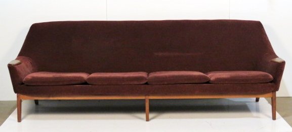 DANISH MODERN UPHOLSTERED TEAK SOFA: Red upholstery with teak arms and legs. 32"h. x 97 1/4"w. x 28"d.