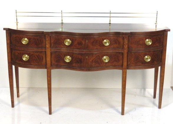 DREXEL HERITAGE BANDED HEPPLEWHITE STYLE SIDEBOARD: Inlaid mahogany with brass gallery. 44"h. x 72"w. x 24"d.