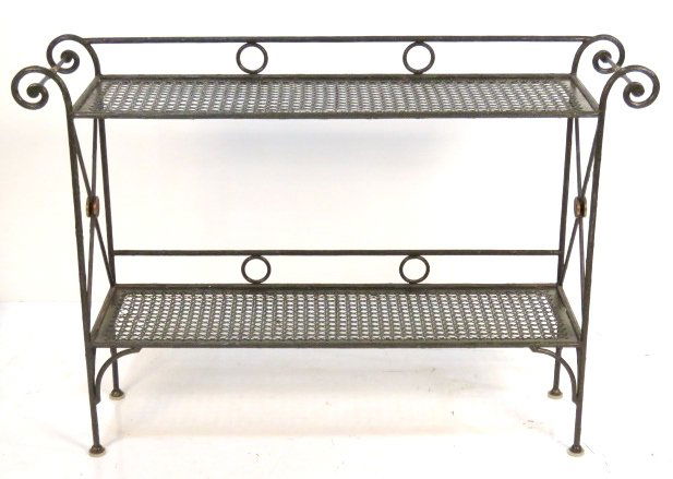 BRANCH FORM WROUGHT IRON SERVER w/ CANED SHELVES: Green painted iron with brass mounts. 37"h. x 54"w. x 17 1/2"d.