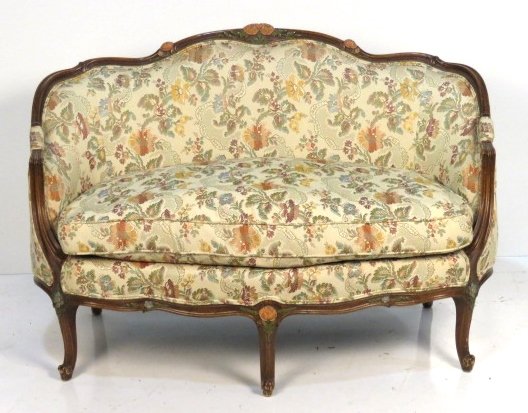 CUSTOM LOUIS XV STYLE PAINT DECORATED LOVESEAT: Finely carved walnut frame with painted flowers. 34"h. x 50"w. x 26 1/4"d.
