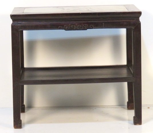 ANTIQUE CHINESE TEAK WOOD MARBLETOP TABLE: Carved teakwood with marble insert. 30 1/2"h. x 40"w. x 20 1/4"d.