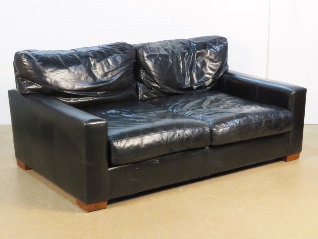 RESTORATION HARDWARE BLACK LEATHER SOFA: Black leather sofa. 32"h. x 72"w. x 44"d.