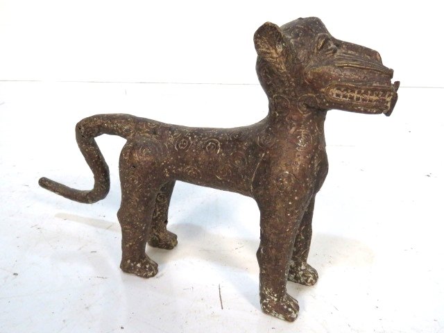 ANTIQUE AFRICAN BENIN BRONZE LEOPARD: Cast bronze with wear. 8 1/2"h. x 12 1/4"w.