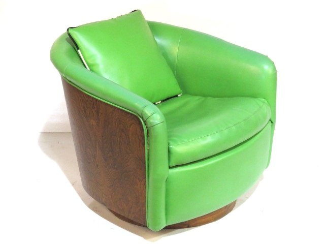 MILO BAUGHMAN STYLE ROSEWOOD LOUNGE CHAIR: Rosewood with green naugahyde. 25"h. x 27 3/4"w. x 29"d.