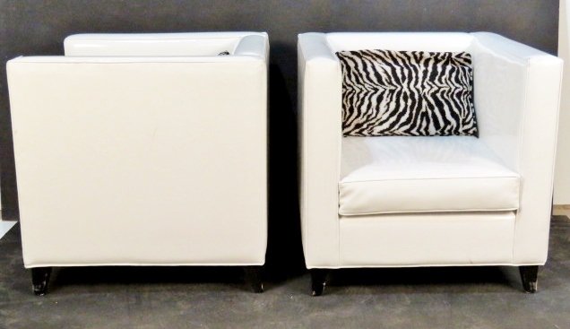 Pair J.A. CASILLAS MODERN WHITE VINYL CUBE CHAIRS: White vinyl with brushed metal legs. 32 1/2"h. x 32 3/4"w. x 33"d.