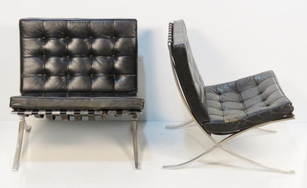 Pair KNOLL MIES VAN DER ROHE BARCELONA CHAIRS: Flat metal with leather cushions. 30"h. x 31"w. x 33"d.