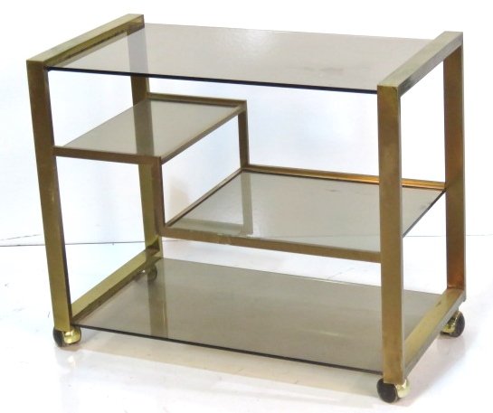1970's ITALIAN MODERN BRASS & GLASS TEA CART: Smoke glass shelves. 25 3/4"h. x 30 3/4"w. x 17"d.