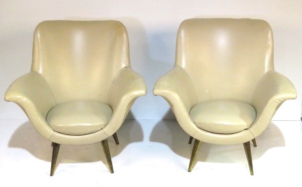 Pair ITALIAN MODERN BRASS LEG LOUNGE CHAIRS: Brass clad legs. Vinyl upholstery. 34"h. x 33 3/4"w. x 28 1/4"d.
