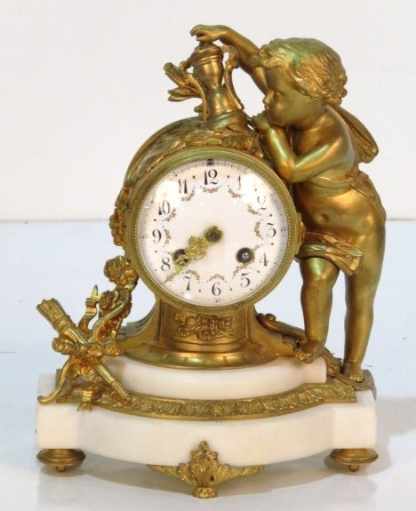 19th c. FRENCH FIGURAL GILT BRONZE CLOCK w/ CHERUB: Gilt bronze and alabaster. 10 1/2"h. x 8 1/4"w. x 5 1/4"d.