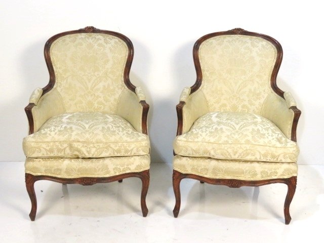 Pair LOUIS XV STYLE CARVED WALNUT BERGERES: Finely carved walnut frame. 37"h. x 27 1/2"w. x 28"d.