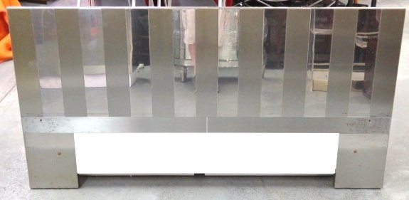DIRECTIONAL METAL LAMINATE HEADBOARD & BED: Sheet metal clad. 33 1/4"h. x 65 3/4"w.