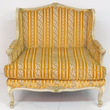 LOUIS XV STYLE CARVED WIDE BERGERE: Distressed cream paint. 36"h. x 38 1/2"w. x 25"d.